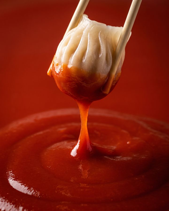 Dumplings lifted with chopsticks
